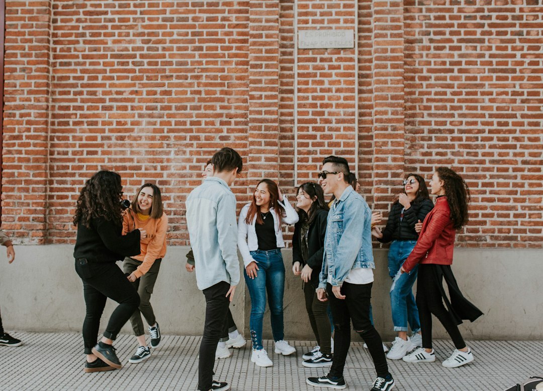 group of teenagers talking together